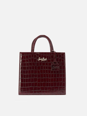 Shop Bag Midi Handbag in burgundy crocodile-print leather