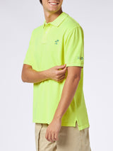 Herren-Poloshirt aus fluogelbem Piquet mit St. Barth-Logo und Vintage-Effekt