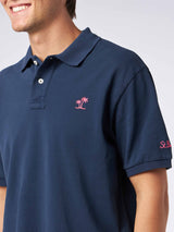 Polo da uomo in piquet blu con logo St. Barth ed effetto vintage