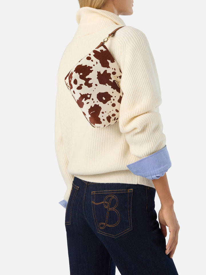 Aline bag in cow print pony hair with metal logo plaque