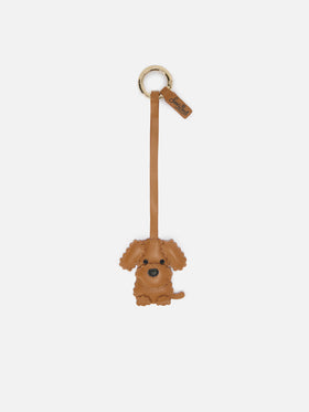 Bag charm a forma di cane in pelle liscia con targhetta logo