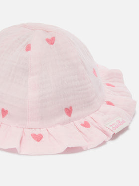 Cappellino da sole Doremi in mussola rosa con ricamo cuori