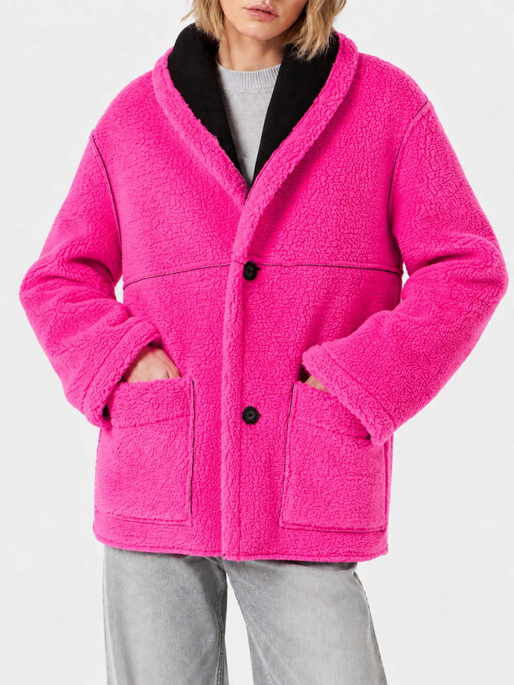 Manteau réversible en shearling Dorys noir et rose fluo 