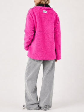 Black and fluo pink Dorys reversible shearling coat