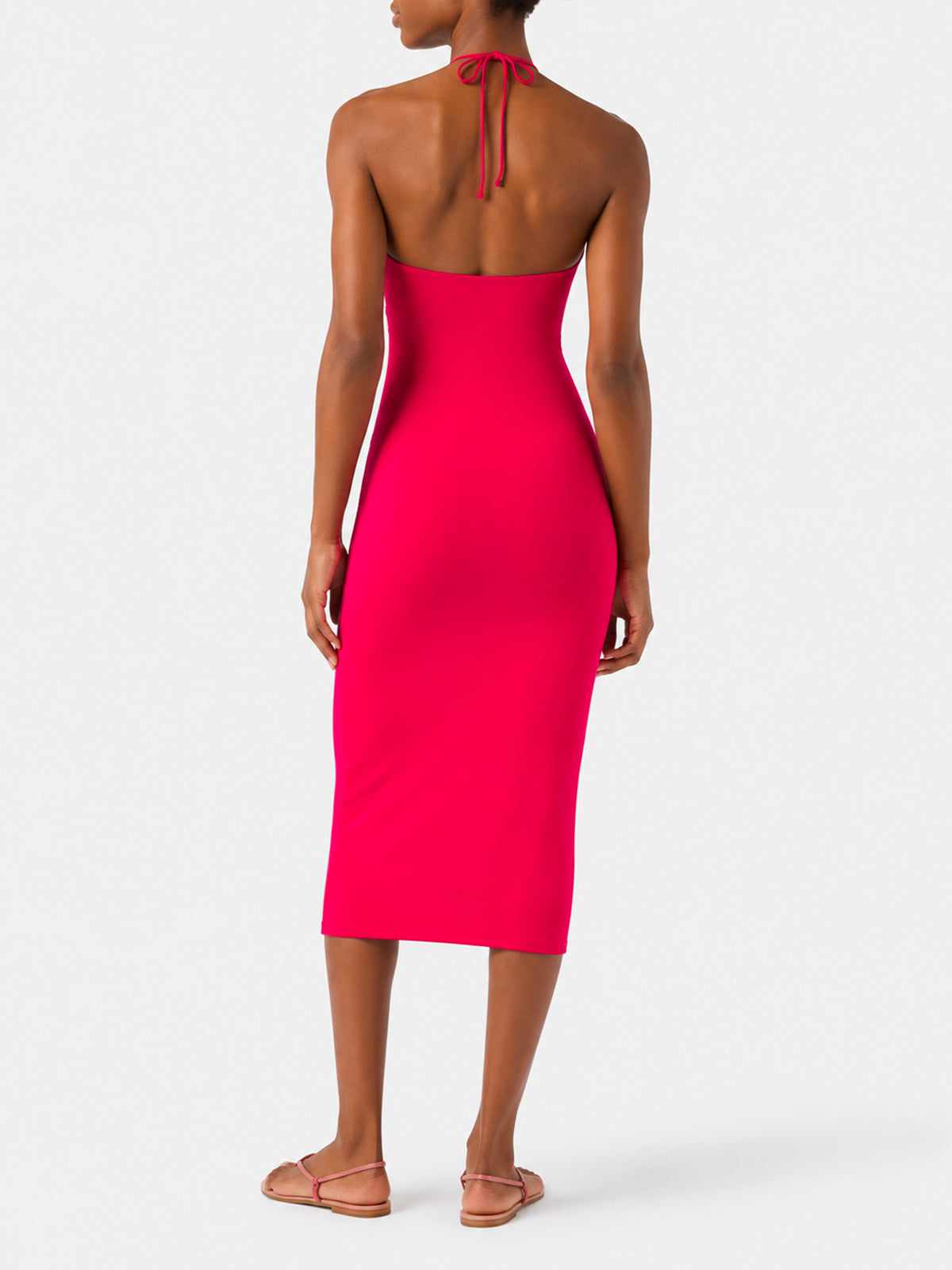Abito fucsia con taglio longuette