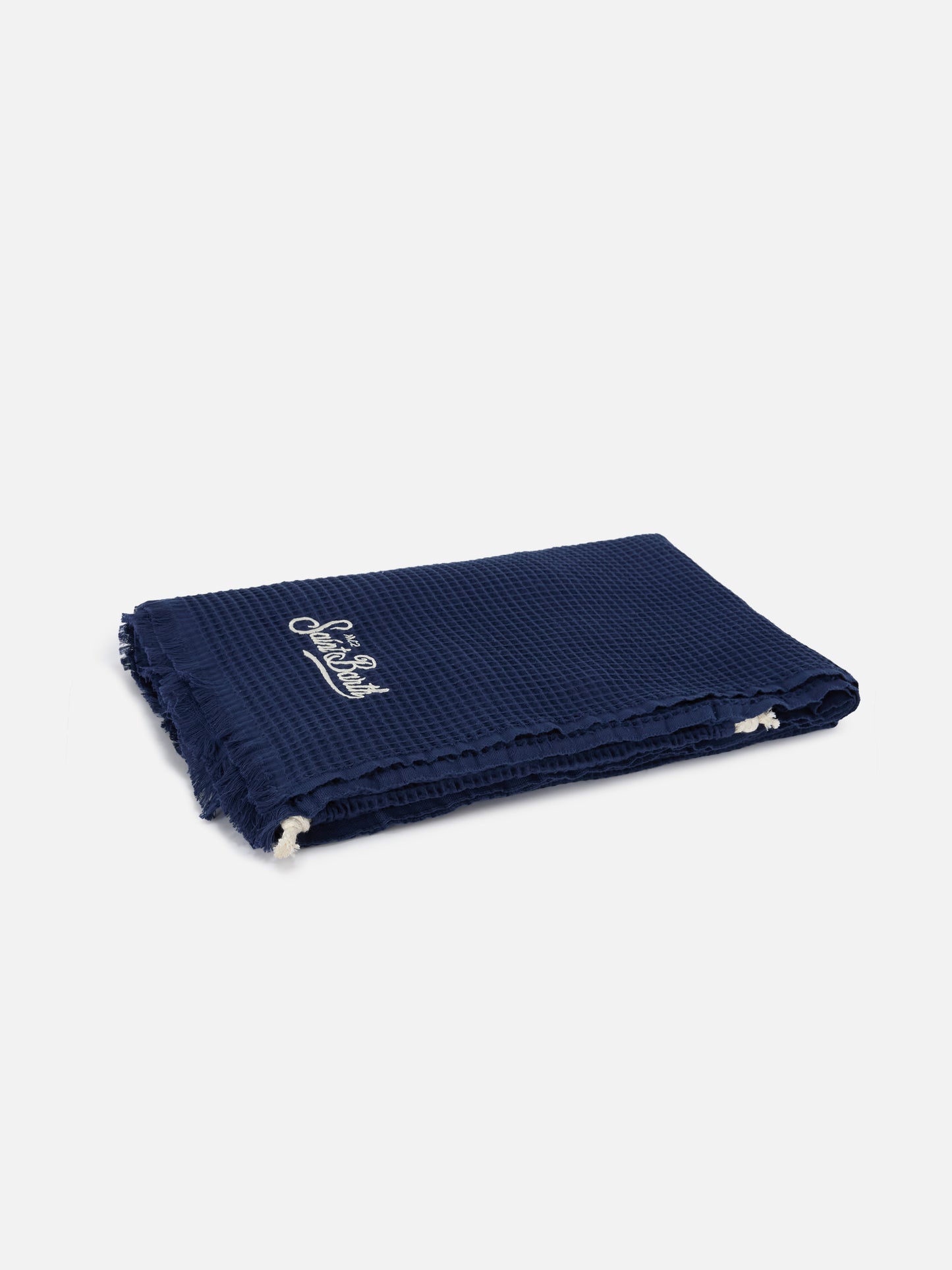 Blue beach towel with integrated bag