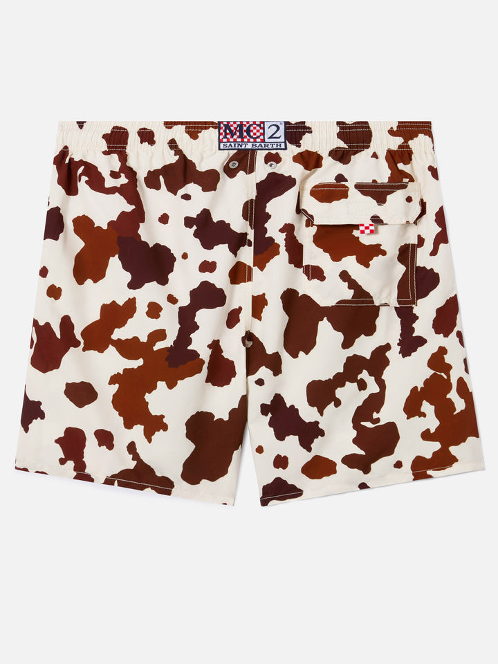 Gustavia swim shorts with cow print