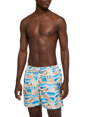 Mid-length Gustavia swim-shorts with Mykonos postcard print | AI CO-CREATED DESIGN BY RICKDICK - POWERED BY RED-EYE