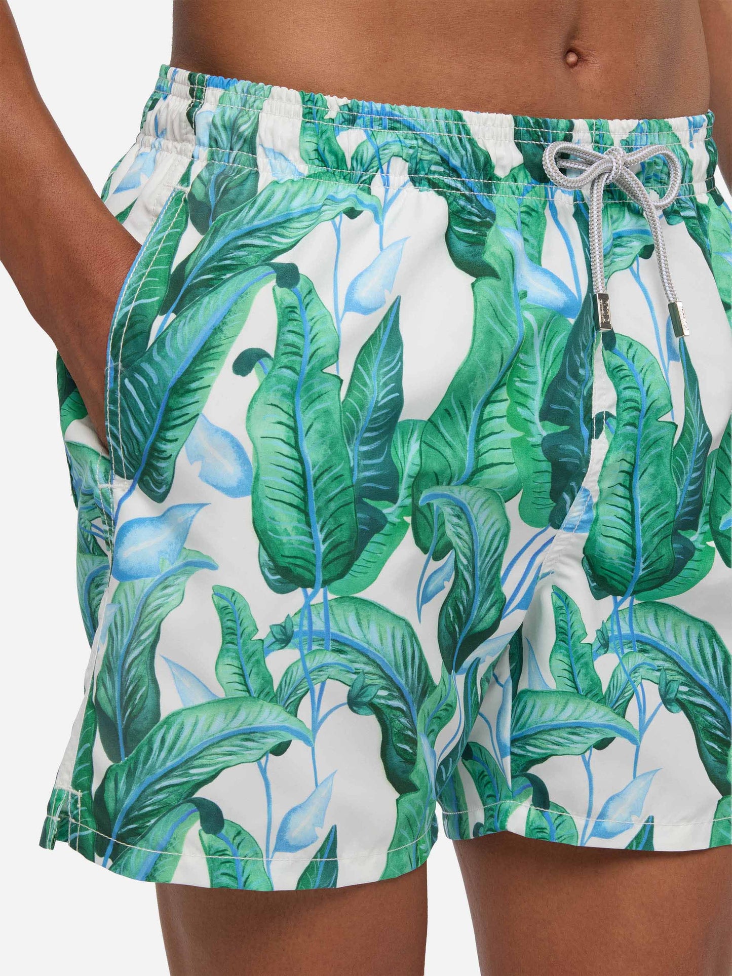 Tropical leaf print mid-length swim shorts