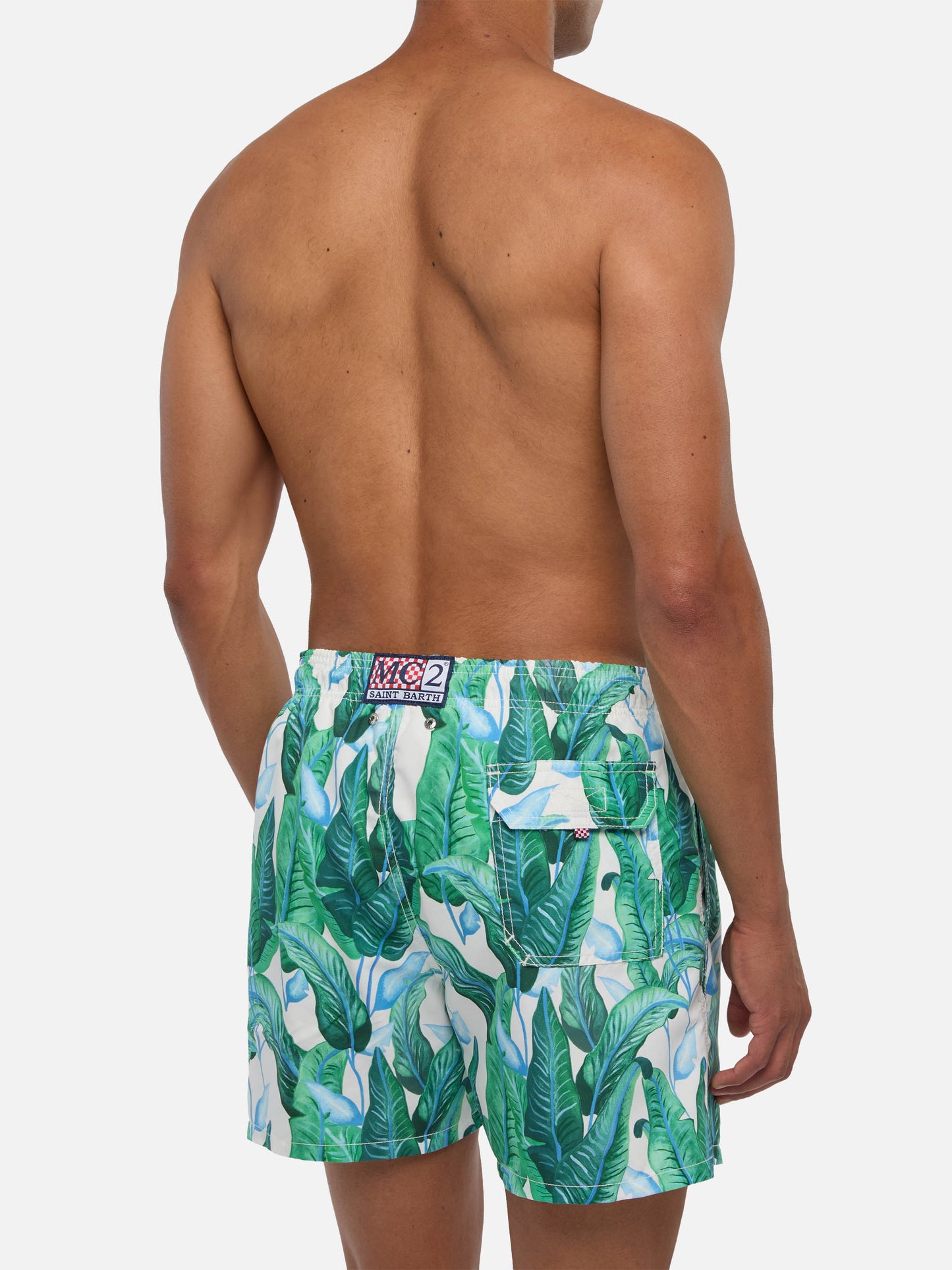 Tropical leaf print mid-length swim shorts