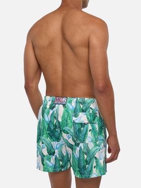 Tropical leaf print mid-length swim shorts