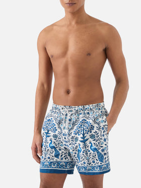 Gustavia white swim shorts with contrasting peacock print