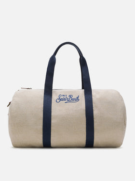 Round Jetleg beige linen weekender with contrasting embroidered logo