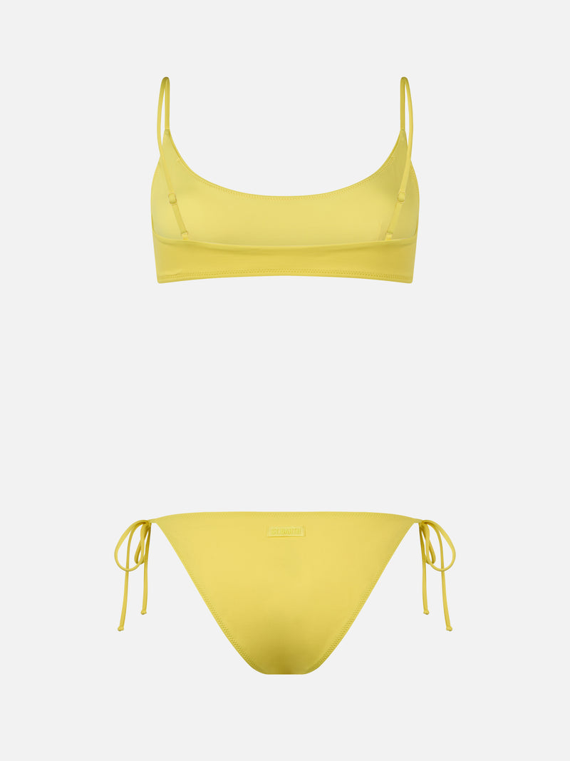 Woman pale yellow bralette bikini Judy Virgo