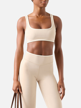 Top fitness Kassie beige con bordi a contrasto