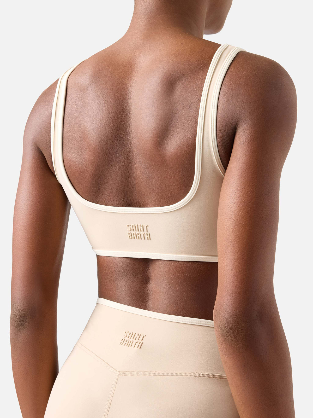 Top fitness Kassie beige con bordi a contrasto