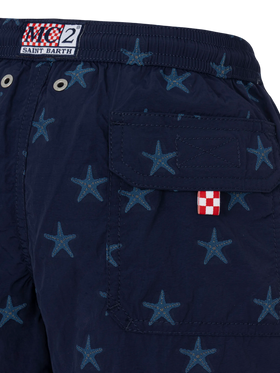 Patmos Jr mid-length swim shorts with seastar jacquard