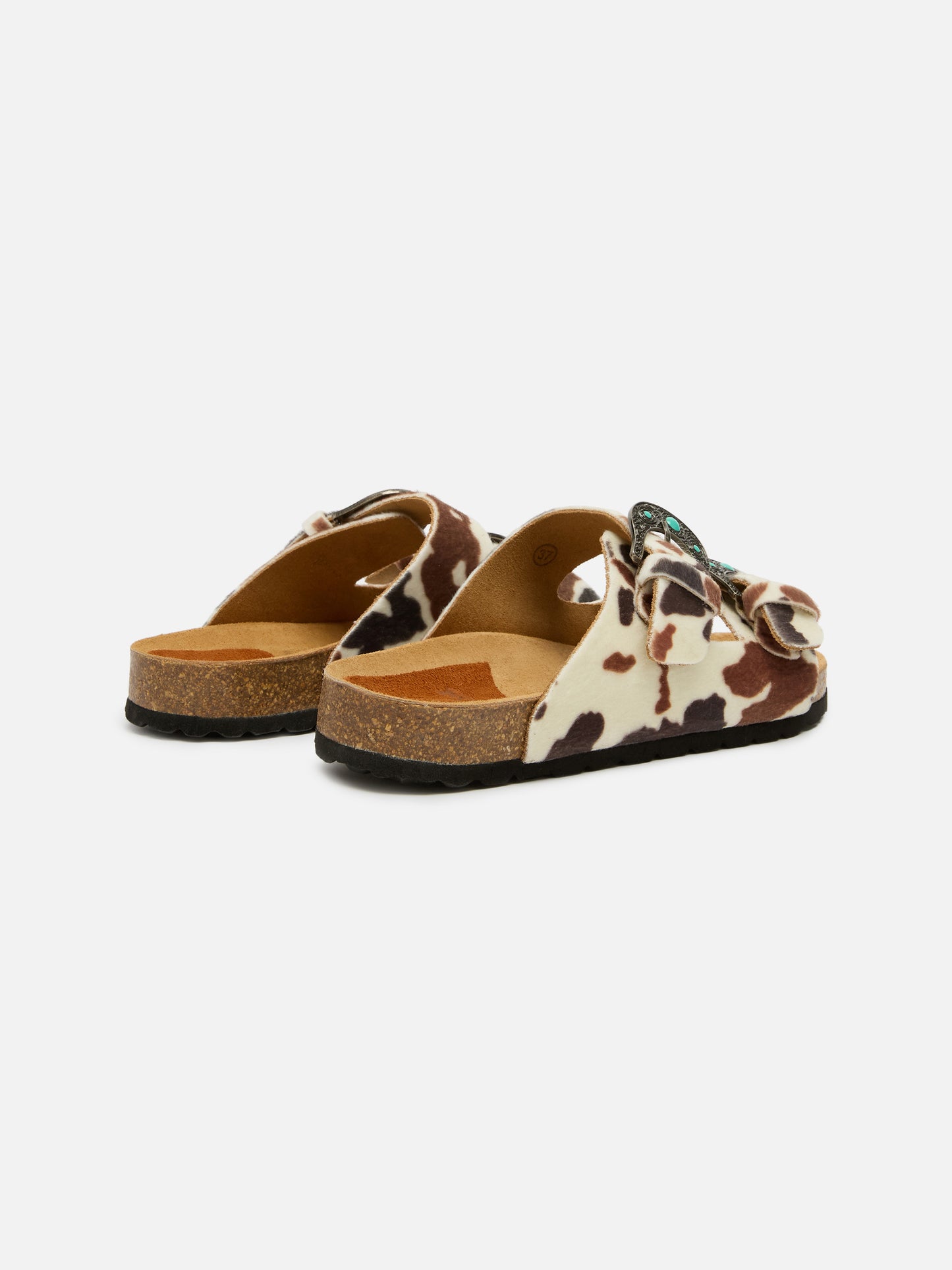 Buckle sandals in cow-print pony hair | TAJI SPECIAL EDITION