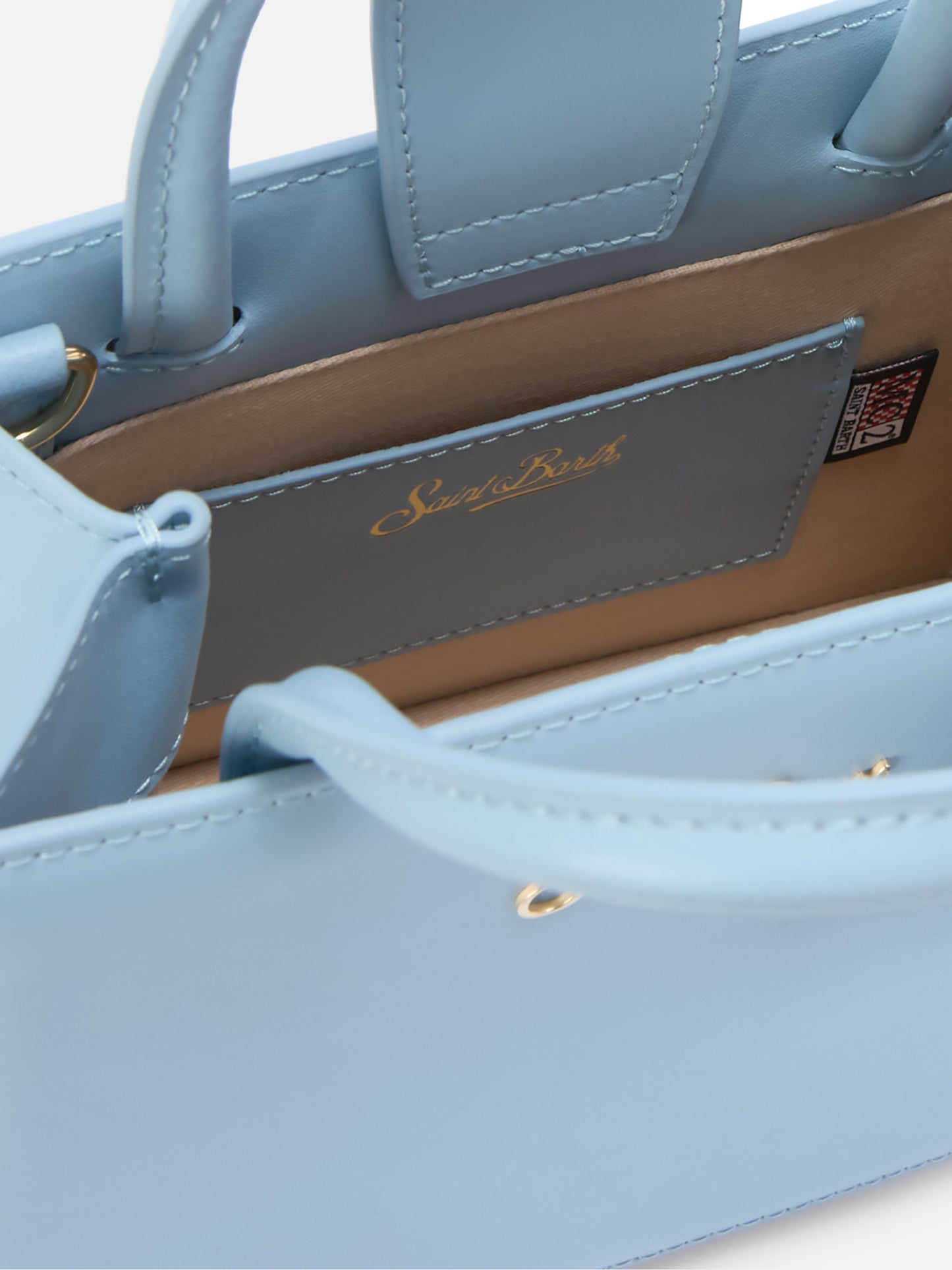 Strukturierte Shop Mini Bag aus hellblauem Glattleder mit Metallanhänger 