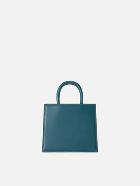 Structured Shop mini bag in teal green smooth leather with metal tag