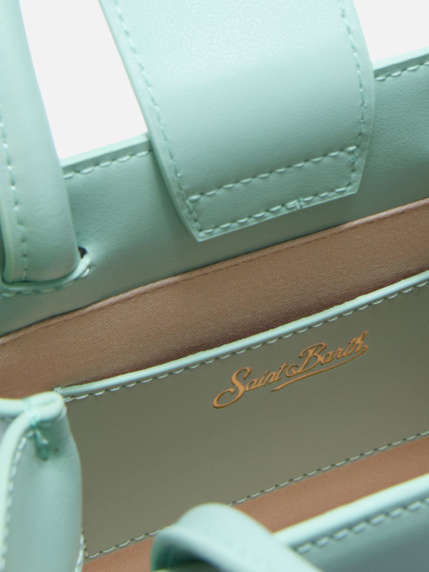 Die Structured Shop Mini Bag aus mintgrünem Glattleder mit Metall-Tag 