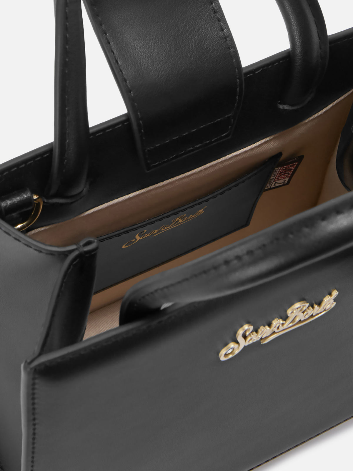 Die Structured Shop Mini-Bag aus schwarzem Glattleder mit Metallanhänger 