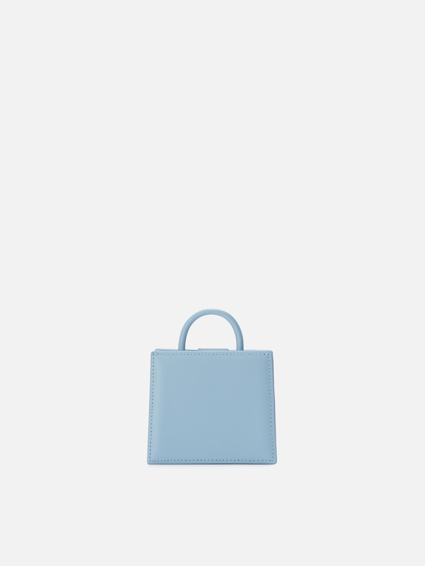 Structured Shop micro bag in light blue smooth leather with metal tag