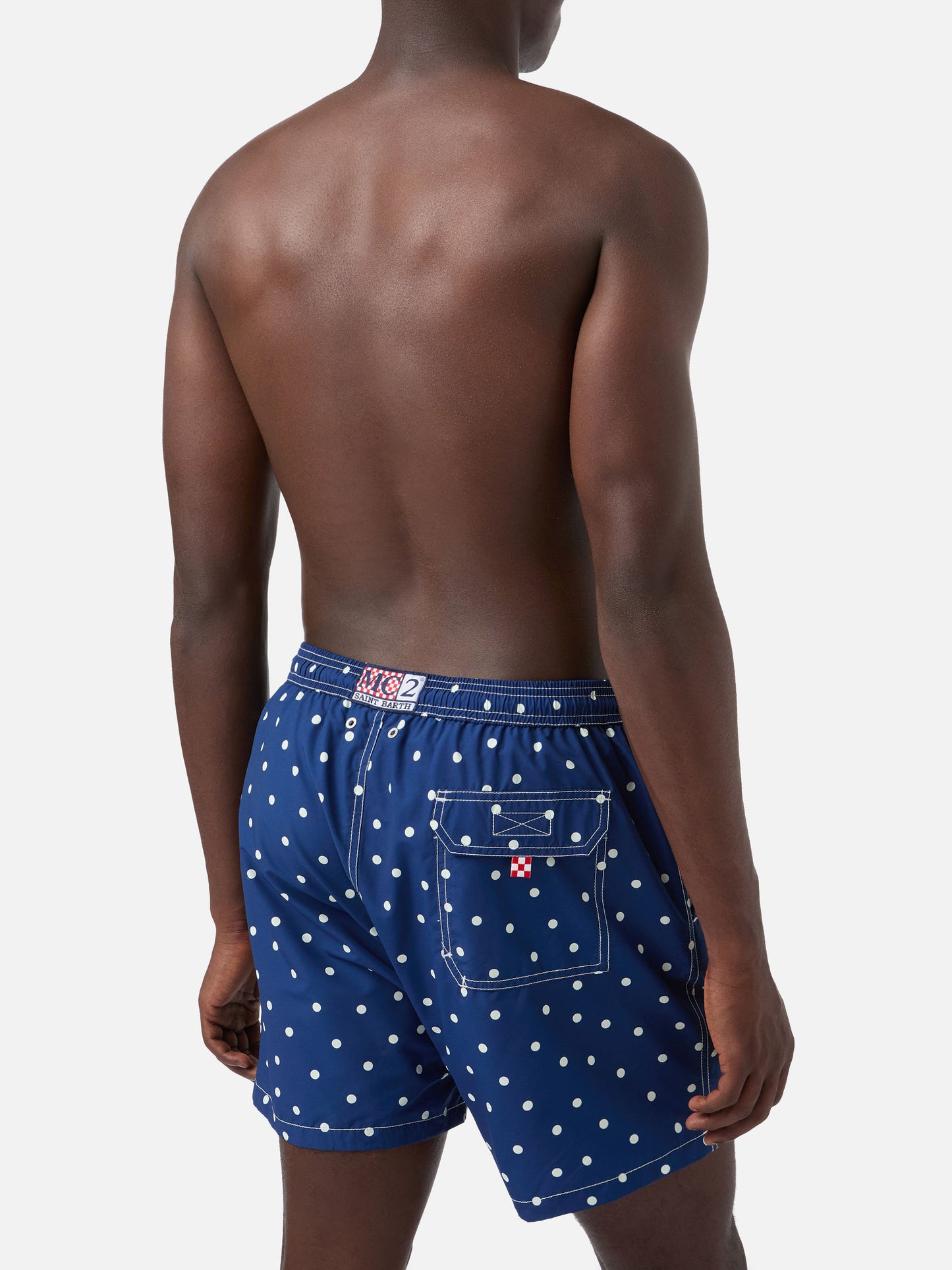 Costume mare Syros blu con ricamo pois a contrasto