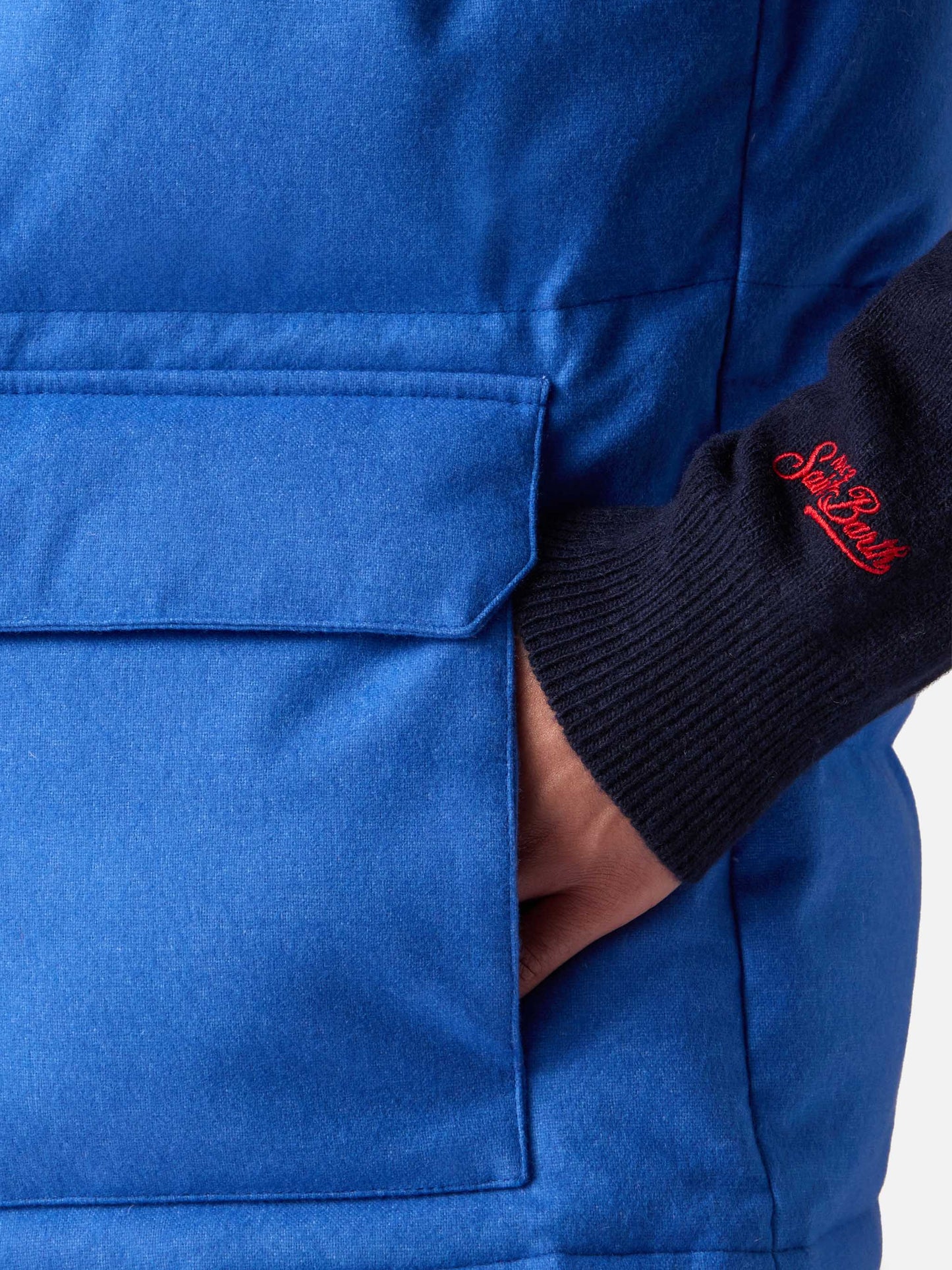 Herrenweste aus blauer Wolle mit Daunenfüllung und Taschen