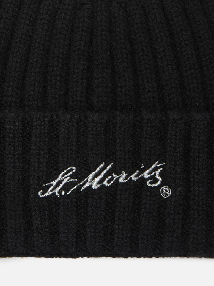 Berretto Wengen in cashmere nero con ricamo St. Moritz