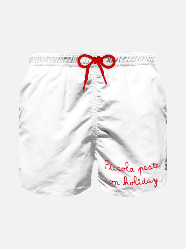 Boy swim shorts with embroidered red writing