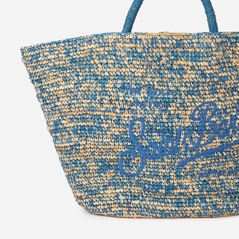 Tasche aus Bast in Blau und Weiß mit Stickerei vorne