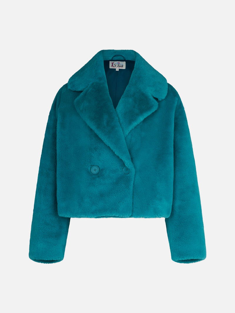 Woman furry short teal jacket