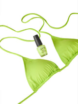 Woman lime green triangle bikini