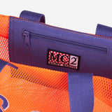 Orangefarbene Einkaufstasche aus Mesh mit Frottee-Stickerei vorne