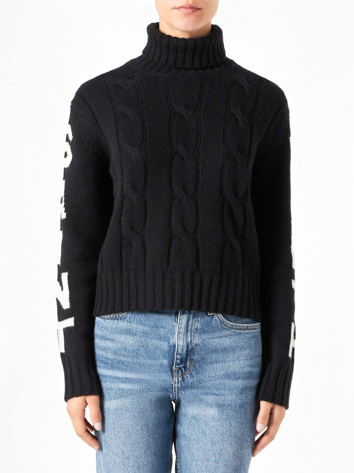 Maglione nero da donna a collo alto intrecciato