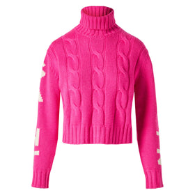 Woman fluo pink turtleneck braided sweater